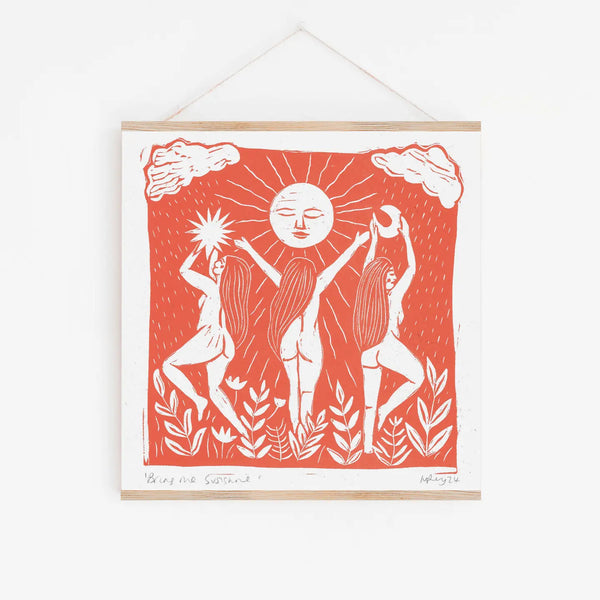 Framed artwork with a red background and white figures and sun design.