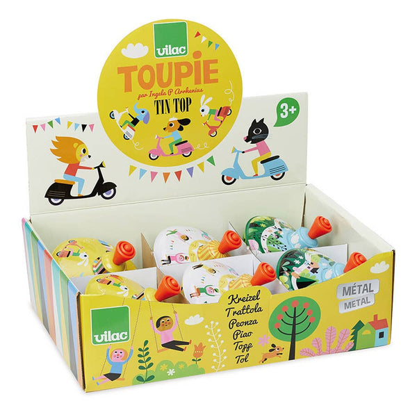 Display box of Vilac Toupie Tin Top toys with colourful packaging and illustrations.