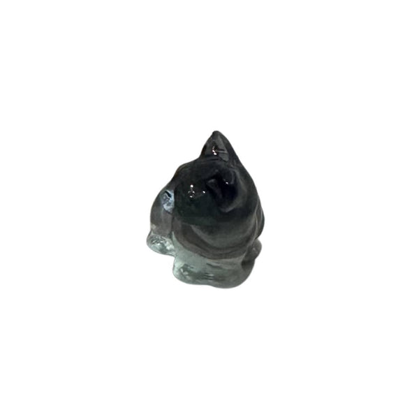 Crystal cat figurine on a white background
