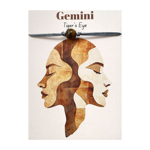 Tiger's eye gemstone bracelet with Gemini design on a white card