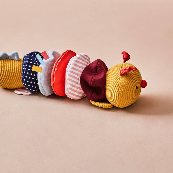Colourful knitted caterpillar baby toy