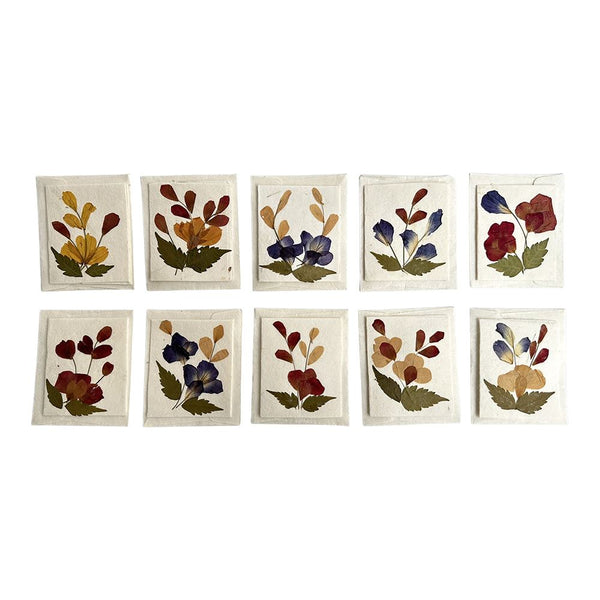Set of ten floral mini gift cards on a white background
