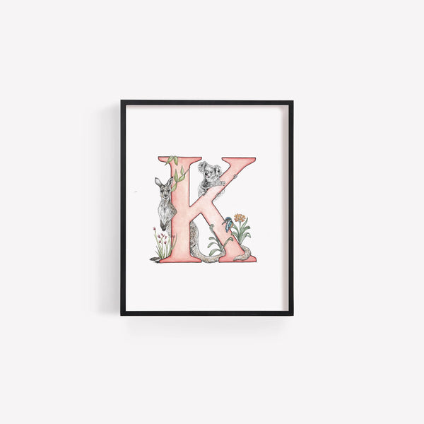 Framed artwork of a pink letter 'K' with koala and kangaroo illustration on a white background