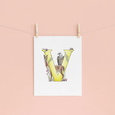 Letter 'V' print with animals on a pink wall