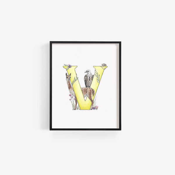 Framed artwork of a yellow letter 'V' with animal illustrations on a white background