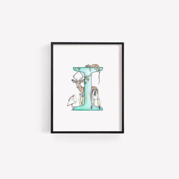 Framed artwork of a decorative letter 'I' with animals on a white background