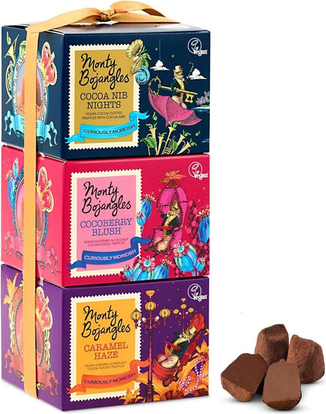 Three colourful boxes of Monty Bojangles chocolates with a decorative ribbon on a white background.