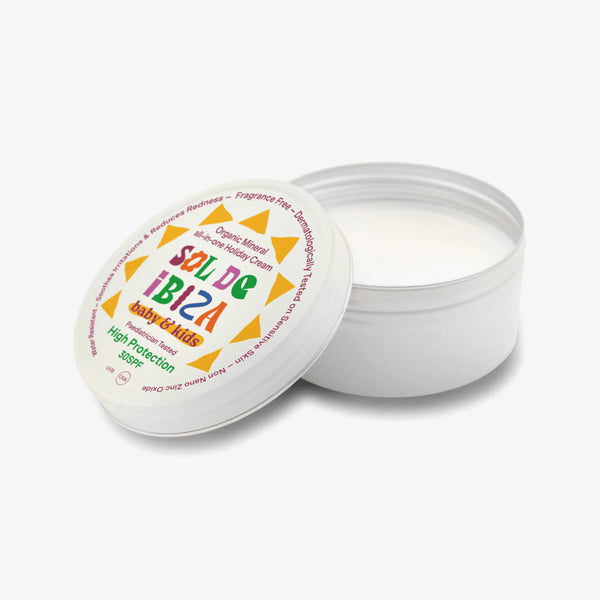 Open container of Sol de Ibiza baby & kids sunscreen with lid on a white background